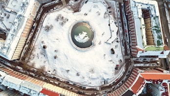 Aerial View Of Temppeliaukion Kirkko Under The Snow Helsinki Finland Aerial View Shutterstock 1042271983