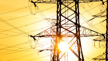 Cover Of Electricity Mid Year Update July 2024 High-voltage tower with sunrise background