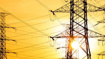 Cover Of Electricity Mid Year Update July 2024 High-voltage tower with sunrise background