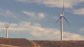 Cover Of Renewable Energy Opportunities For Namibia Two Gray Wind Turbines Under Cloudy Blue Sky During Daytime Unsplash